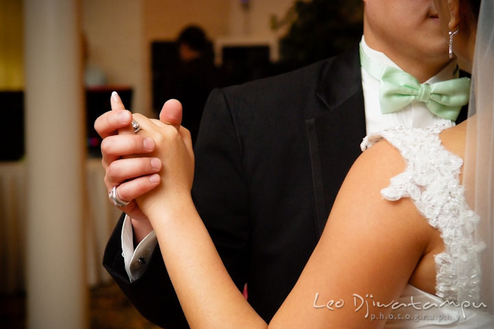 Bride and groom first dance as husband and wife. Showing wedding and engagement rings. Ceresville Mansion Frederick Maryland Wedding Photo by wedding photographer Leo Dj Photography